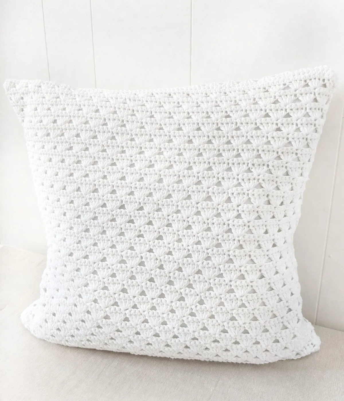 An easy handmade crochet pillow that is made using Lion Brand Coboo Yarn. 