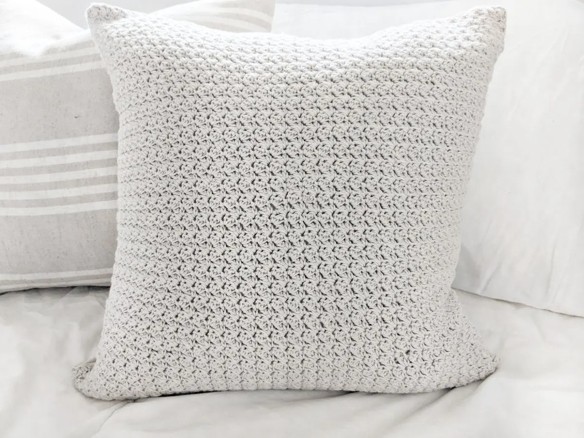 A textured crochet pillow pattern.