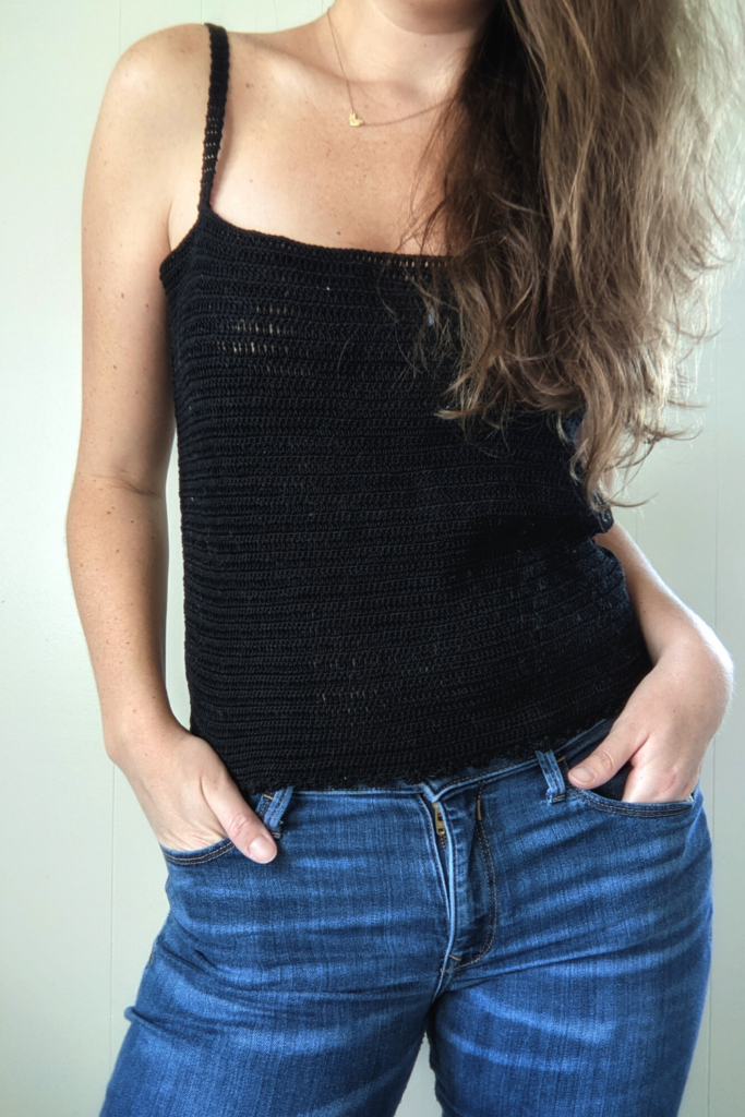 crochet lace tank top on a pair of jeans