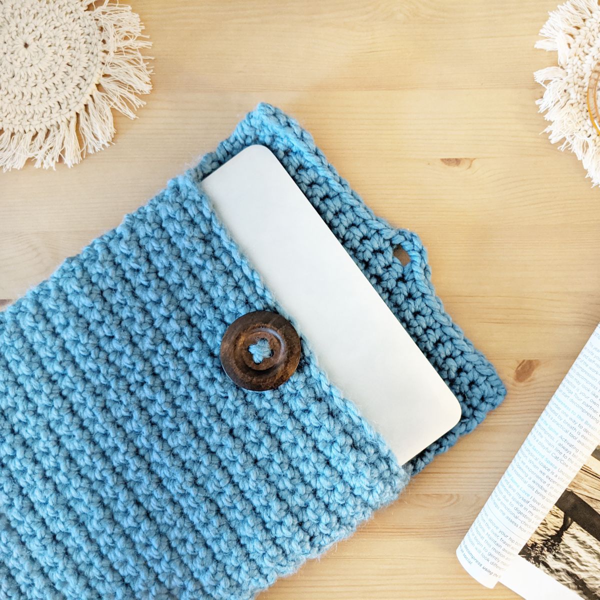 a bulky weight crochet laptop cover made in single crochet stitches