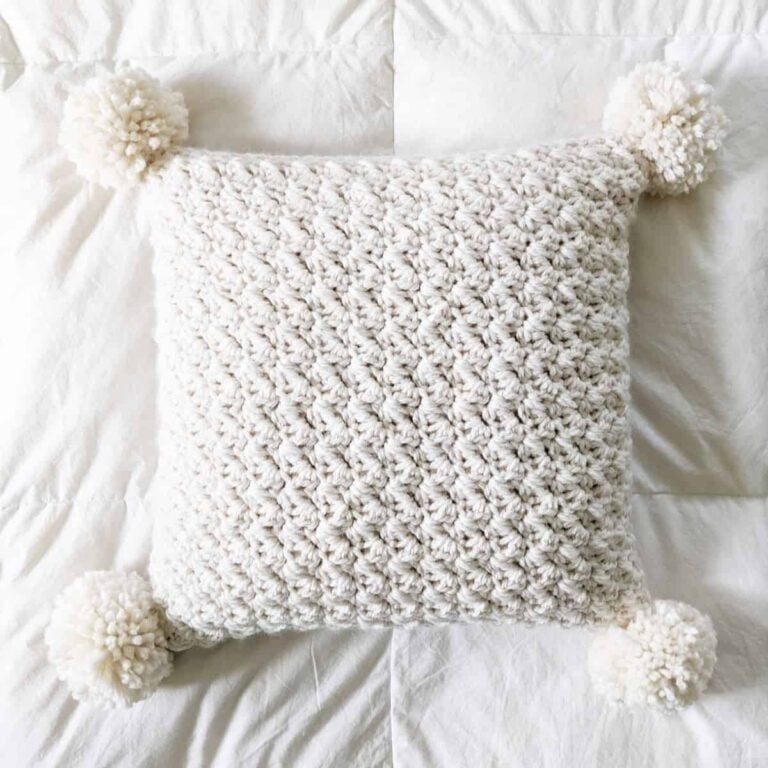crochet chunky pillow with pom poms a free pattern
