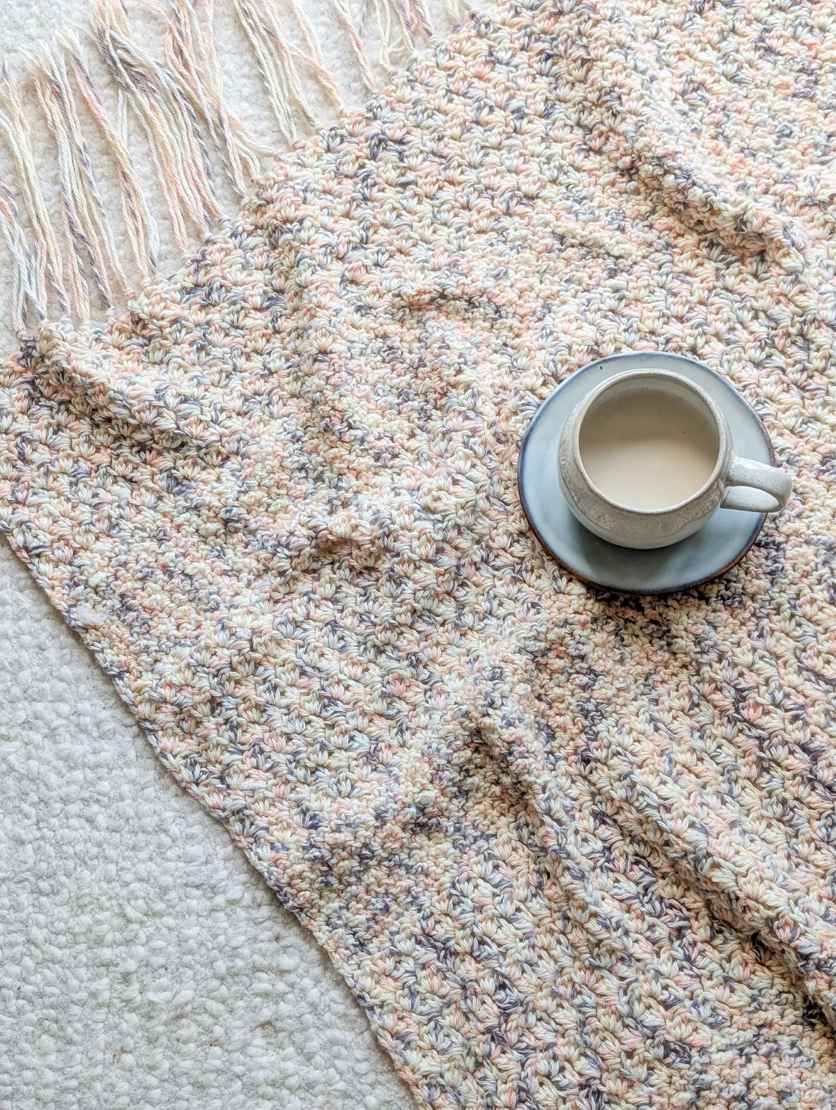 A crochet blanket made with single crochet, double crochet, and chain stitches.