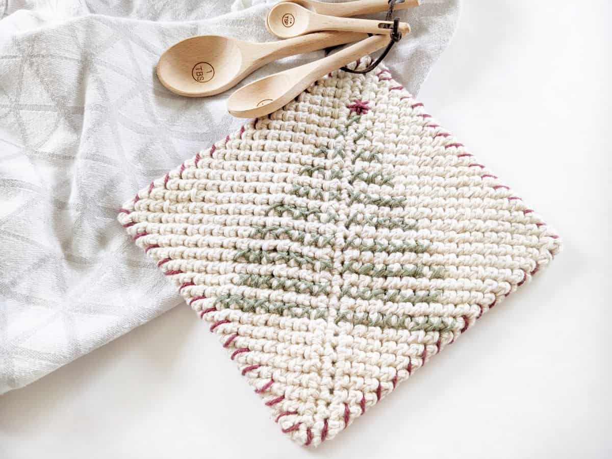 double-thick cotton crochet potholder with an embroidered Christmas tree