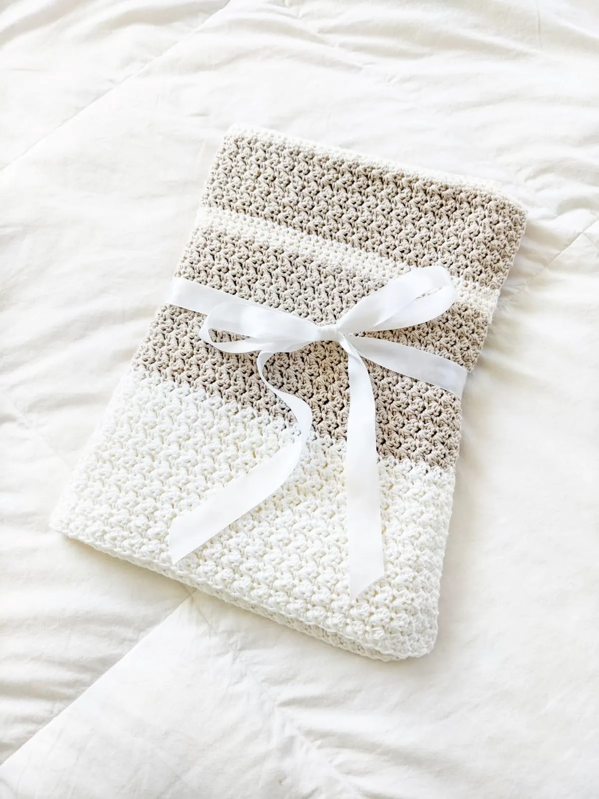 a crochet baby blanket shower gift idea for expecting mothers