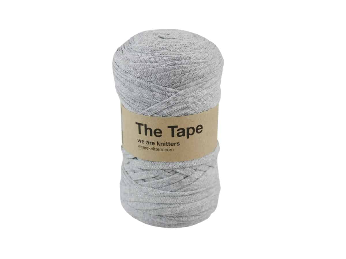 A grey ball of We Are Knitters Tape yarn.