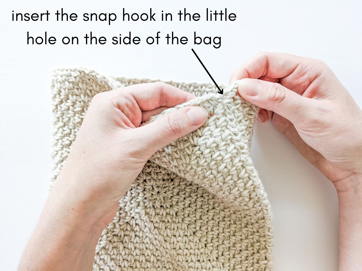 Image shows where to snap your hook onto your crochet bag.