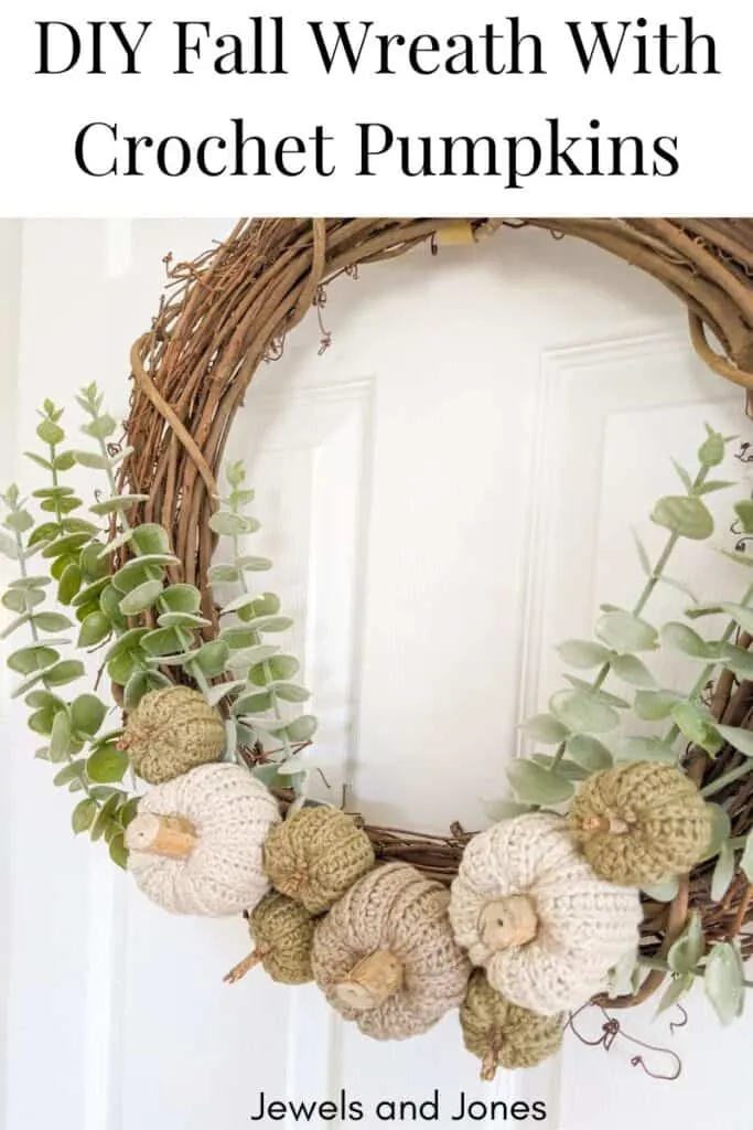 A grapevine wreath with small and large crochet pumpkins.
