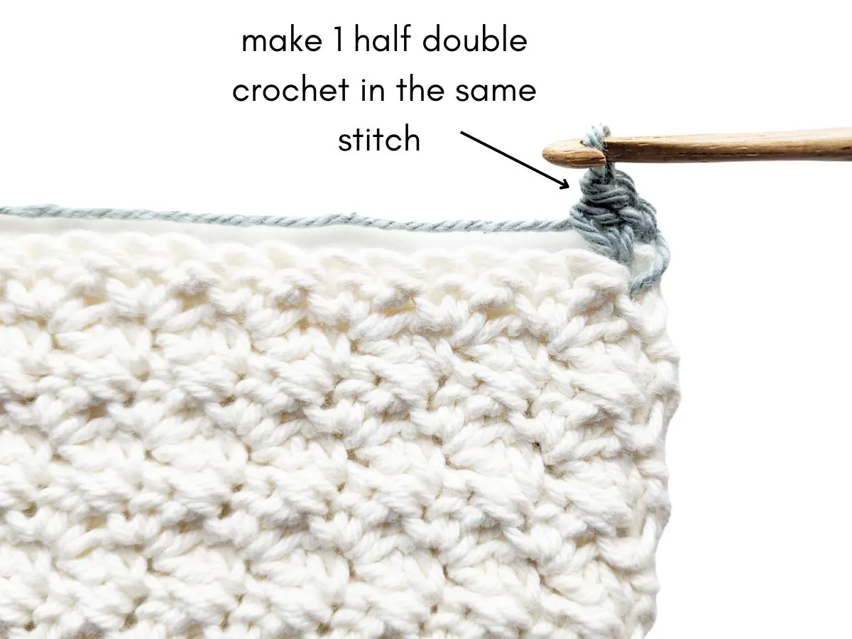 Adding a half double crochet border to a crochet washcloth.