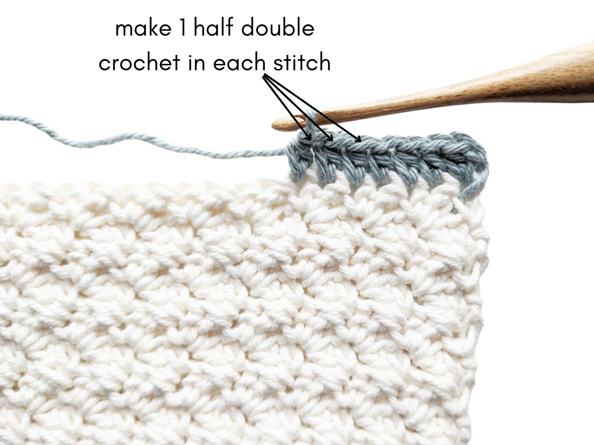 Adding a half double crochet border to a crochet project in a different color. 
