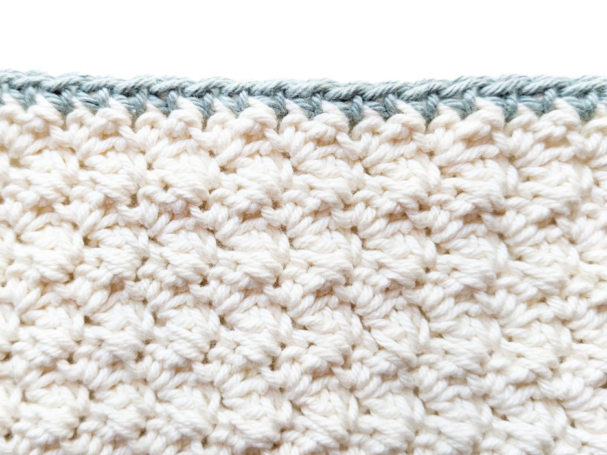 A single crochet border on a crochet washcloth.