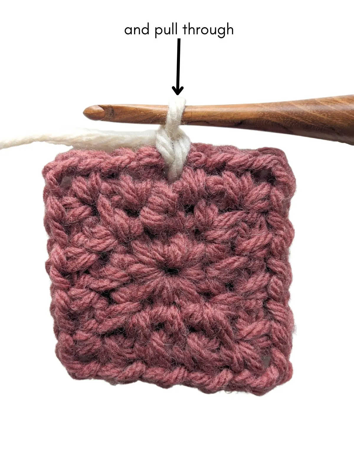 A completed single crochet stitch on a moss stitch square. 