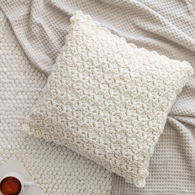 A textured chunky crochet pillow.