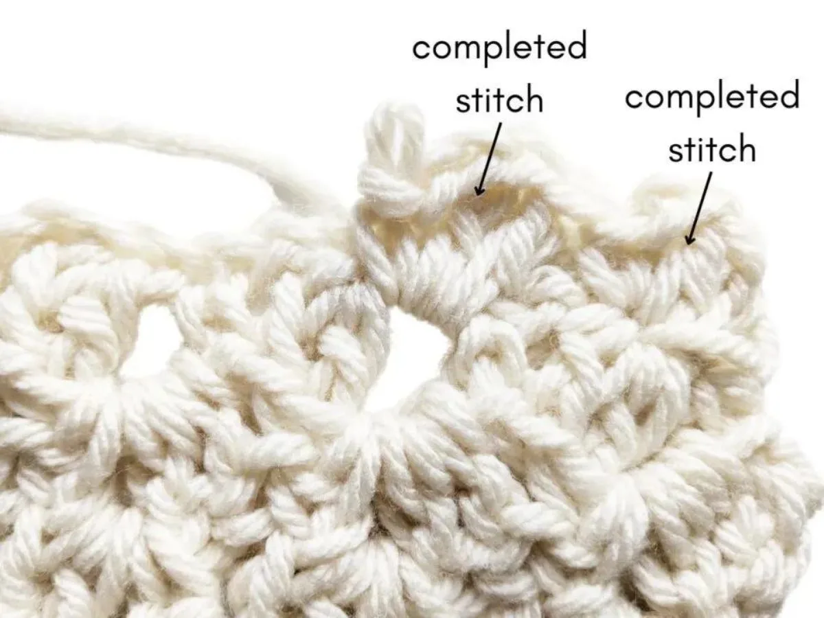 Image explains the steps on how to crochet border on a baby blanket.