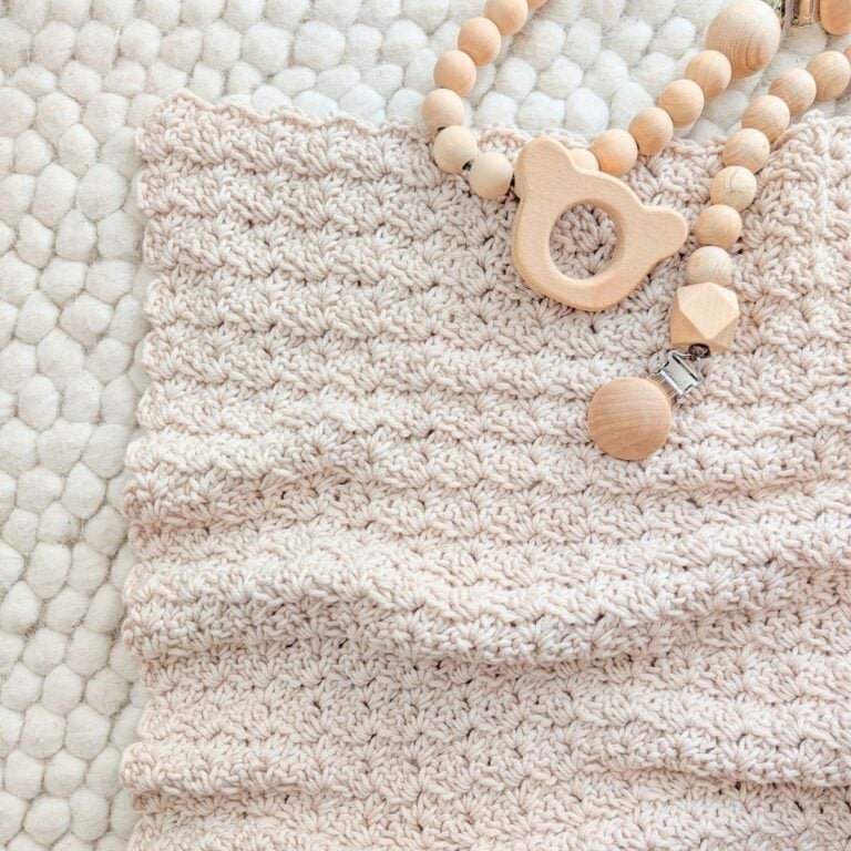 A free crochet baby blanket pattern that's made using a one-row repeat.