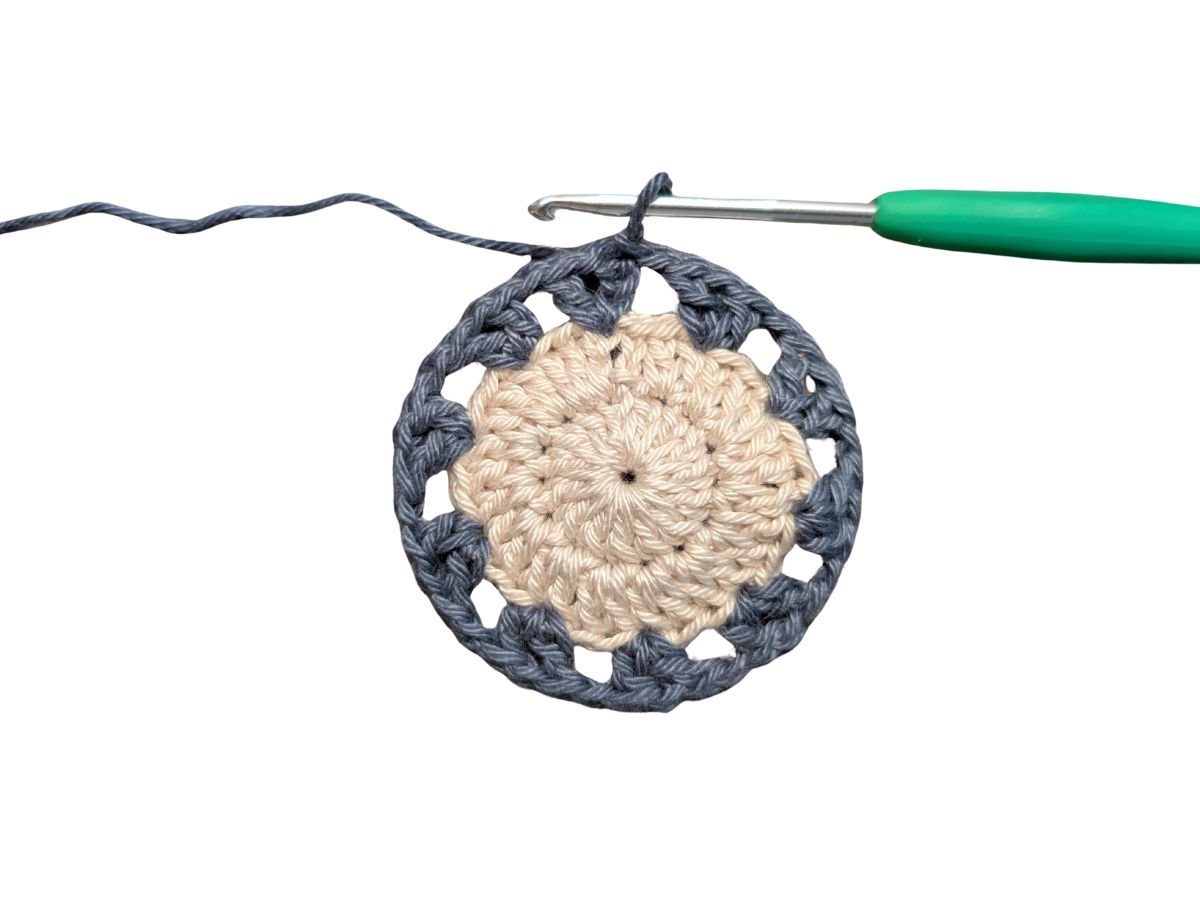 A completed round of double crochets in the round.