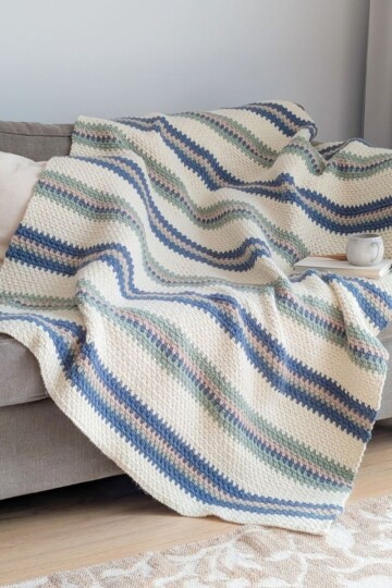 A chunky striped crochet blanket using 4 colors.