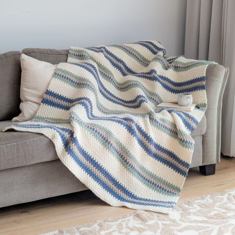 A chunky striped crochet blanket using 4 colors.